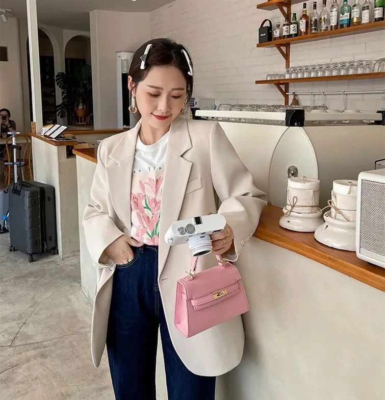 西装一粒扣怎么扣_单粒扣西装时尚搭配_西装配什么扣子